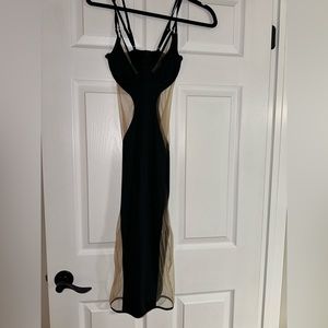 House of CB. Body con black dress with mesh sides. XS